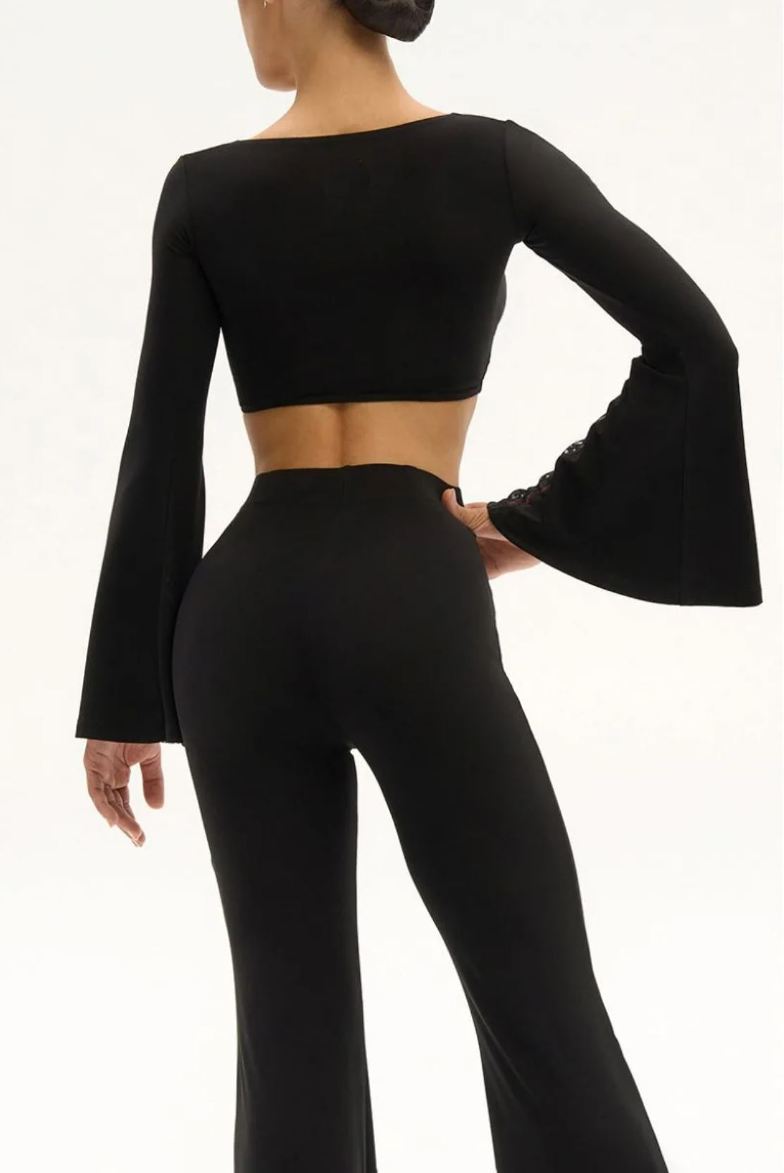 Back view of ladies' Latin dance top with flared sleeves