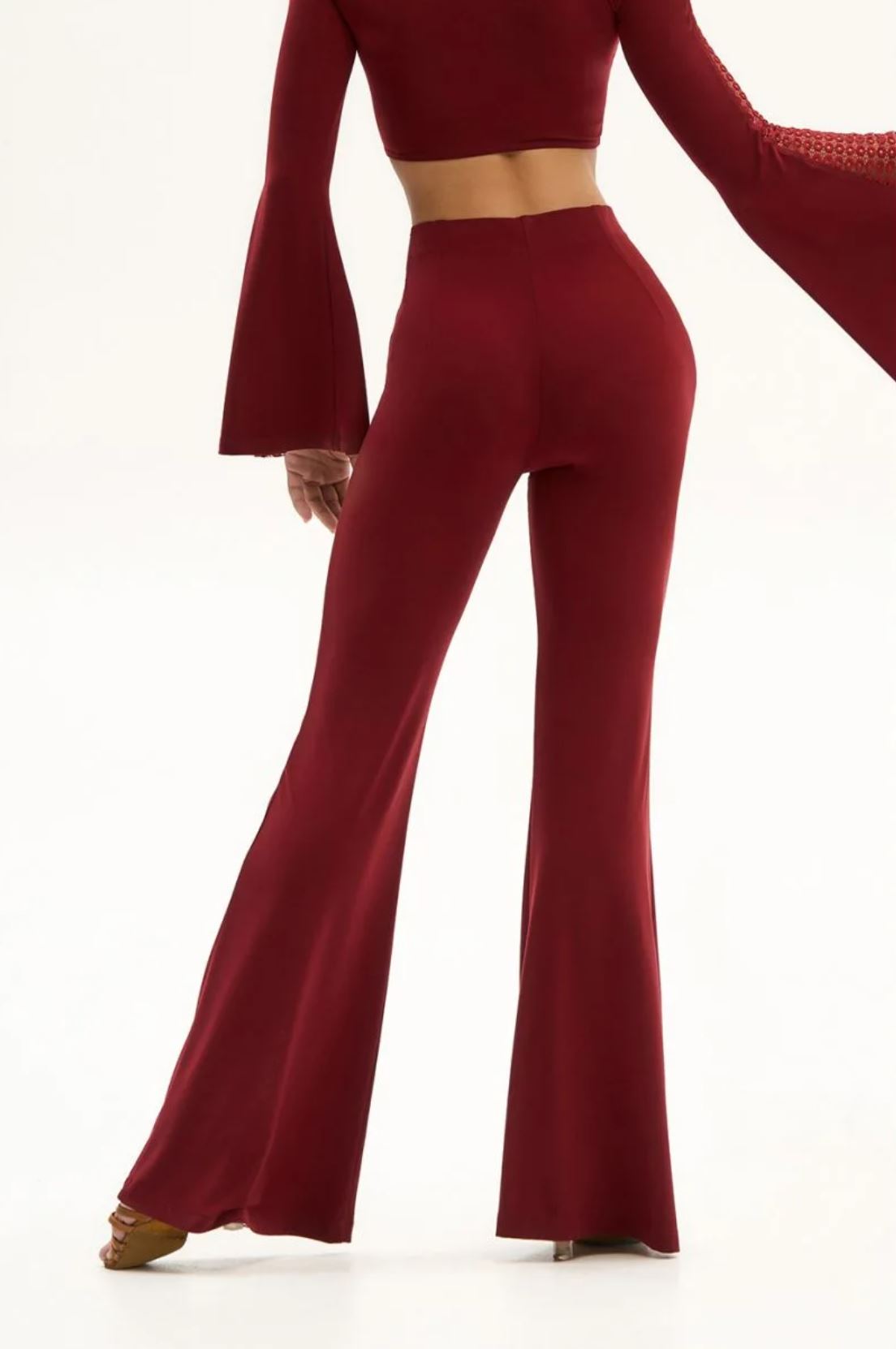 Back view of flared wine red Latin dance pants for women